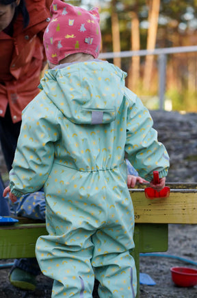 Babyregndress Dugg Jane Pistasj