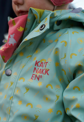 Babyregndress Dugg Jane Pistasj